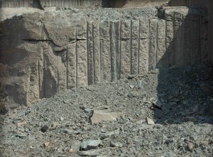 Bluestone bed of consolidated rock exposed for removal
